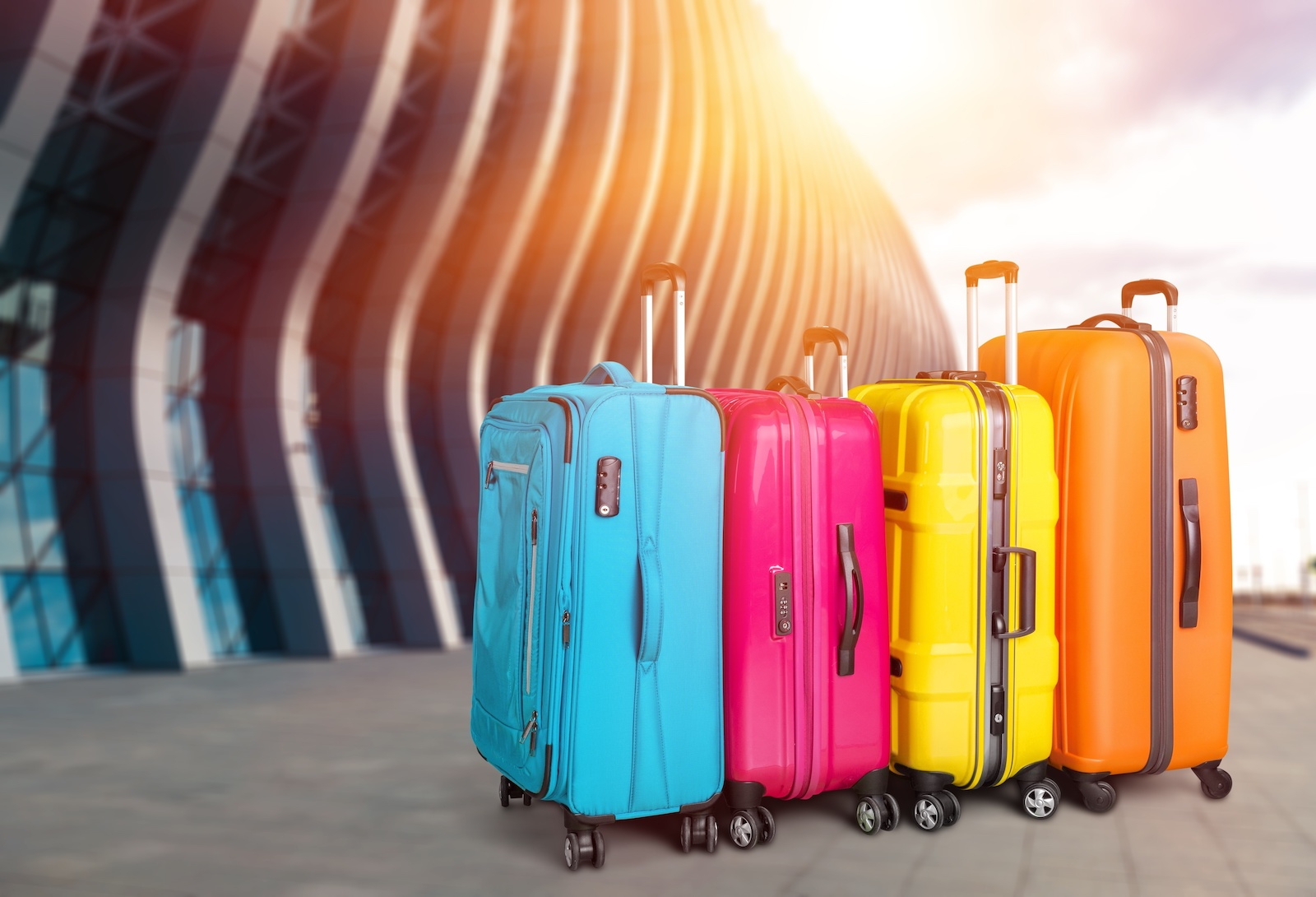 kufferter foran lufthavn